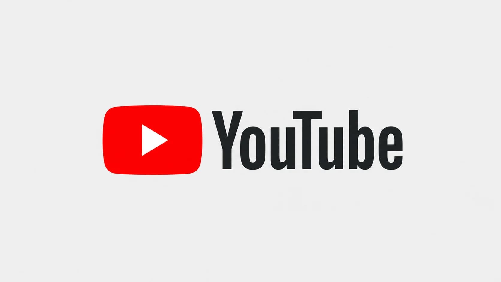 YouTubes röda playikon och svarta ordmärke centrerade mot en ljusgrå bakgrund.